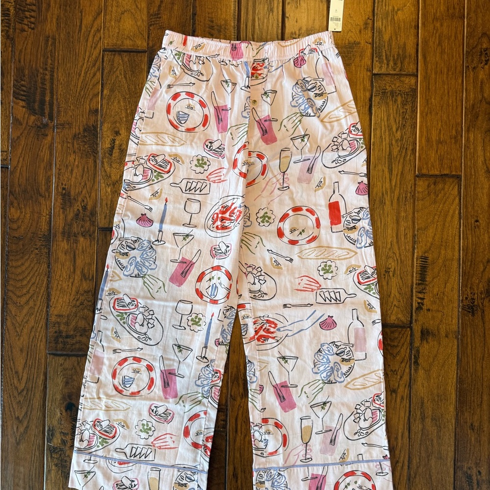 Women’s pajamas pants from Anthropologie with fun dinner print. Brand LyreBird